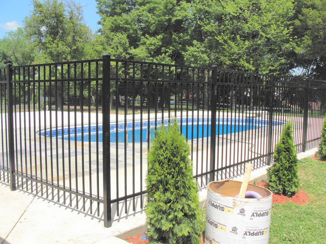 Aluminum fence around swimming pool